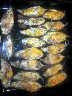 A picture of cheese and bacon jalapenos.