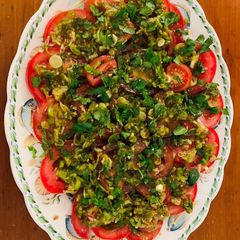 Tomato carpaccio with spring onion and ginger salsa A picture of Tomato carpaccio with spring onion and ginger salsa.