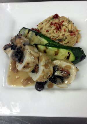 A picture of GREEK CHICKEN ROULADES WITH WHITE WINE SAUCE.
