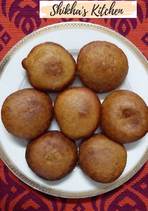 খেজুর গুড় দিয়ে তেল পোয়া পিঠা রেসিপির প্রধান ছবি