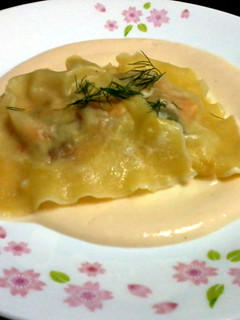 A picture of Salmon Rovioli on Garlic Alfredo Sauce.