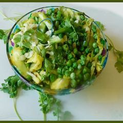 A picture of A celebration of veggies: stir fried cabbage, peas, bok choy.