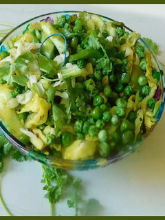 A picture of A celebration of veggies: stir fried cabbage, peas, bok choy.