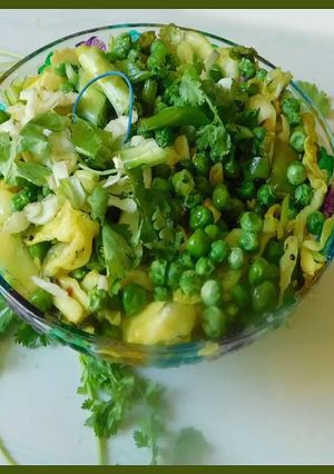 A picture of A celebration of veggies: stir fried cabbage, peas, bok choy.