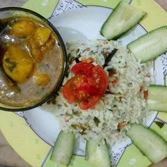 A picture of Methi pulao with choto aloo dum.