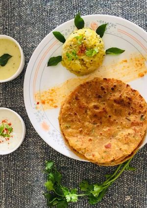 A picture of Khichadi kadhi thepla.
