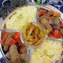 A picture of Chullo kabab with butter rice.