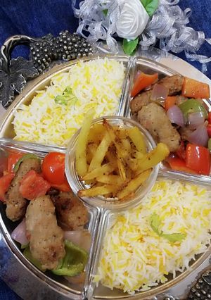 A picture of Chullo kabab with butter rice.