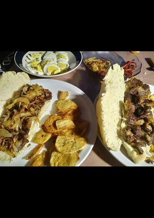 Una foto de Sándwich de carne y de pollo 💥🔥💥