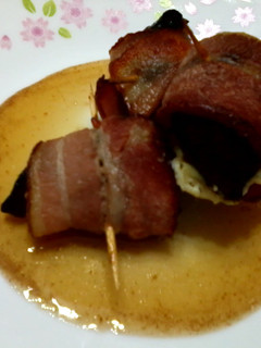 A picture of Bacon Wrapped Plum And Cheese With Sherry Vineger Honey Sauce.