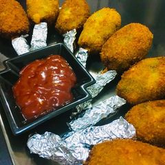 A picture of Potato corn peas cutlets.