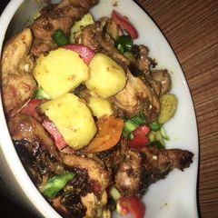 A picture of Grilled chicken and potatoes.