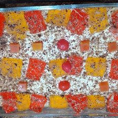 A picture of Colourful fruit custard.