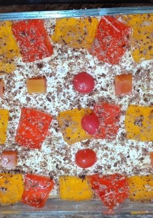 A picture of Colourful fruit custard.