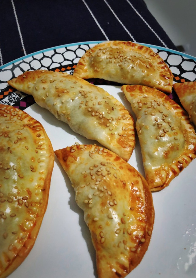 Una foto de Empanadillas de gambas y champiñones