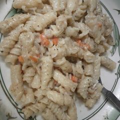 A picture of Cheese white sauce pasta.