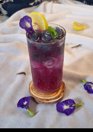 A picture of Blue pea magic layered mocktail.