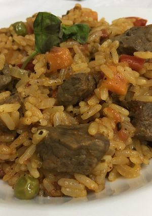 Una foto de Guiso de arroz y carne