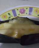 Plátano maduro horneado relleno de jamón y queso