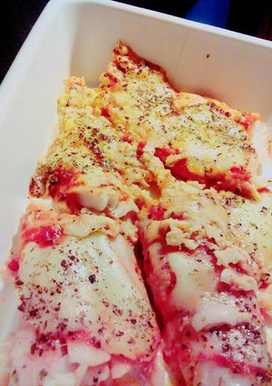 Una foto de Filet de merluza a la pizza 🐟