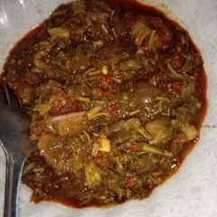 A picture of Pumpkin spinach vegetable soup.