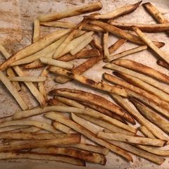 A picture of Oven Baked Homemade Crispy French Fries.