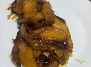 Una foto de chuletas cerdo agridulce
