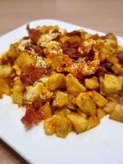 Una foto de Huevos rotos con jamón (Nota 9)