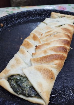 Una foto de Empanada española de acelga vegana