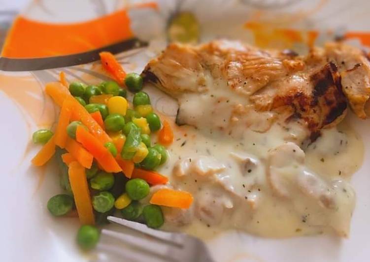 Grilled chicken with mushroom sauce and stir fry veggies