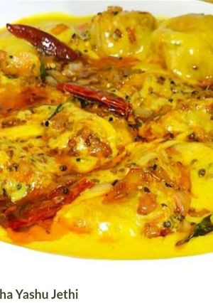 A picture of Punjabi Kadhi Pakora.