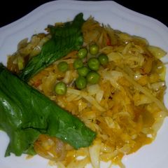 A picture of Fried cabbage with carrots.