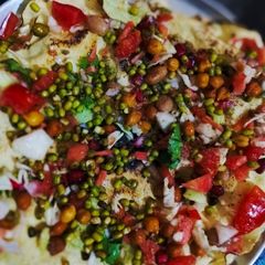 A picture of Masala papad with moong moth.