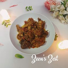 A picture of Natu Kodi Iguru/Country Chicken Curry.