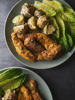 A picture of Crispy Chicken Tenders In Garlic Lemon Butter & Pepper Sauce.
