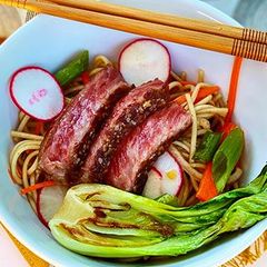 A picture of Ginger-Sesame Soba Noodle Salad with Seared Wagyu Steak.