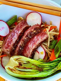 A picture of Ginger-Sesame Soba Noodle Salad with Seared Wagyu Steak.