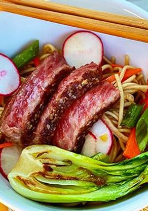 A picture of Ginger-Sesame Soba Noodle Salad with Seared Wagyu Steak.