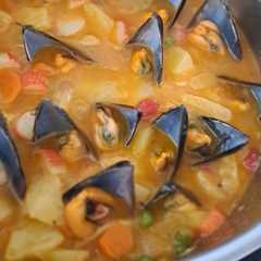 Una foto de Mejillones con patatas al estilo foruca