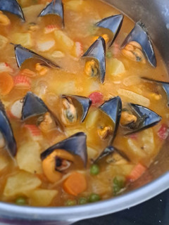 Una foto de Mejillones con patatas al estilo foruca