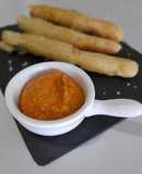 Calcots asados en tempura con salsa romesco