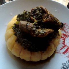 A picture of Eba and Vegetable Soup.