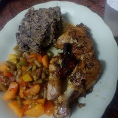 A picture of My favorite meal- mukimo njahi, chicken & Veggies.