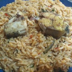 A picture of Native rice with fresh fish.