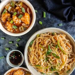 A picture of Veg noodles with chicken Manchurian.