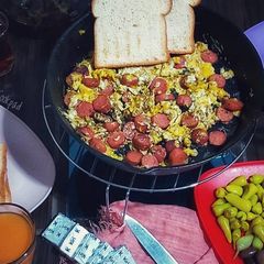 A picture of Eggs with sausage.
