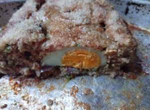 Una foto de Pan de Carne con Cebolla, Ajo, Perejil y Huevo Duro