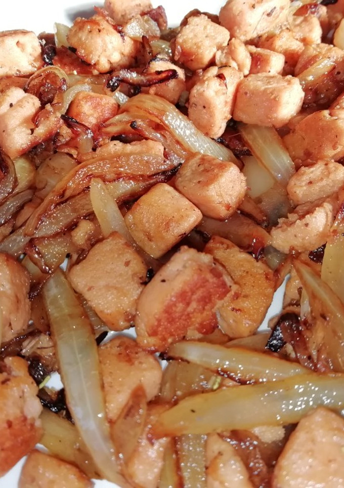 Una foto de Hamburguesa de salmón encebollado