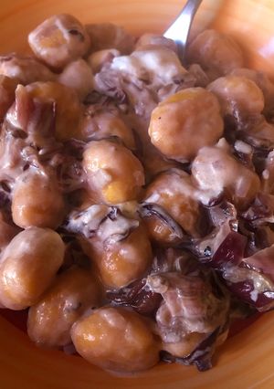 A picture of Pumpkin Gnocchi with Radicchio and Robiola Cheese.