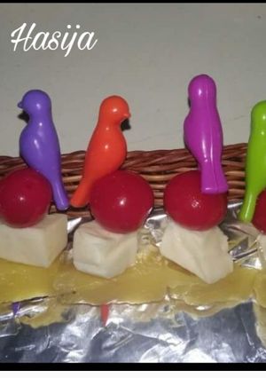 A picture of Cheese Cherry Pineapple On a Stick🍒🍍.